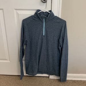 Lululemon surge warm half zip. Size small. Heather blue color.